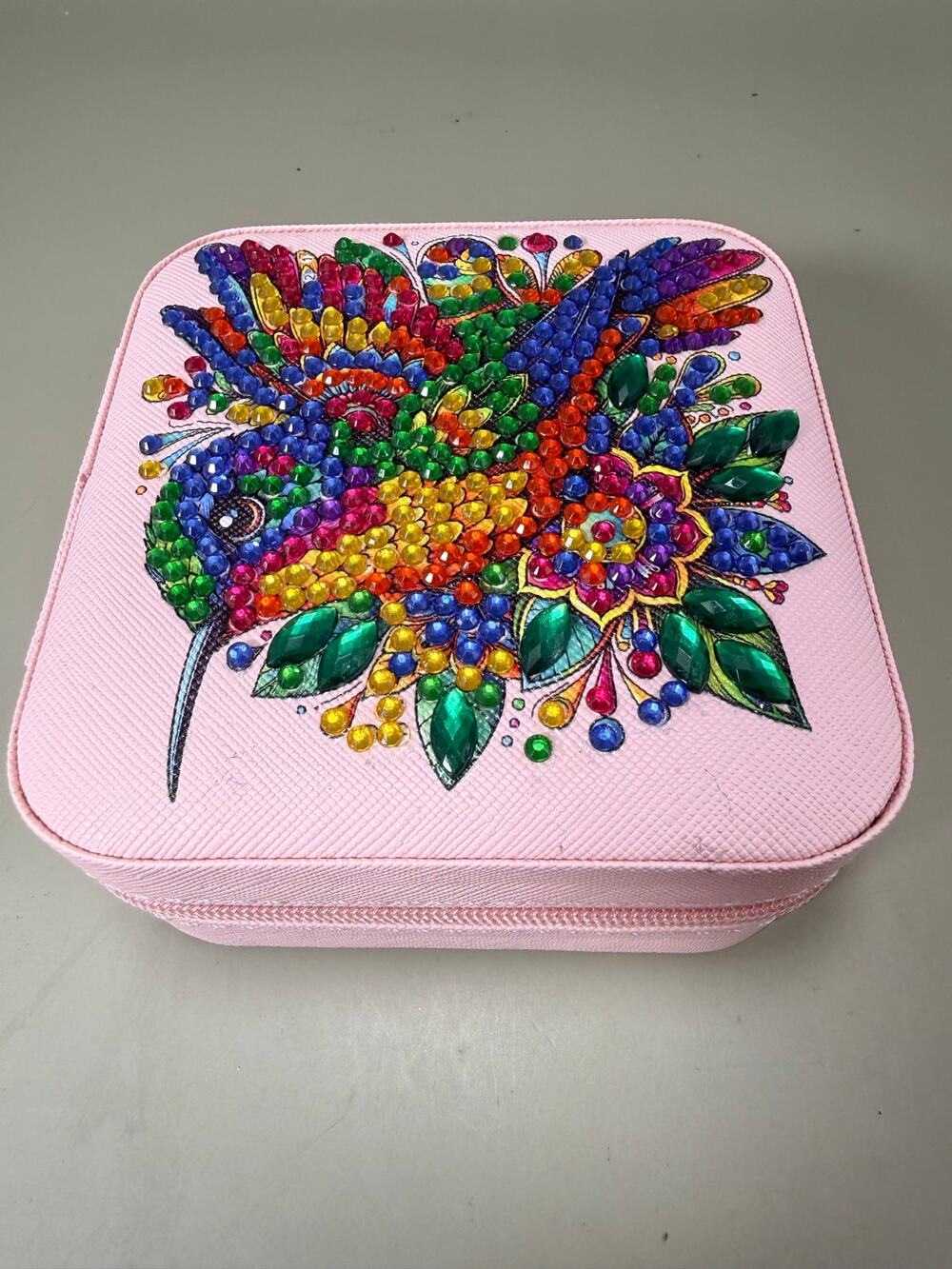 Finished Diamond art pink hummingbird jewelry box with colorful resin gems.